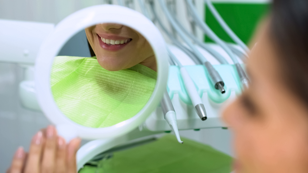 Snow-white,Smile,Reflected,In,Mirror,After,Sealant,Placement,Aesthetic,Dentistry
